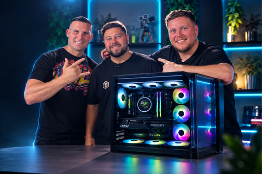 Tom from Build My Rig with Gymskin and Konstantin beside Gymskin’s finished RTX 5080 gaming PC